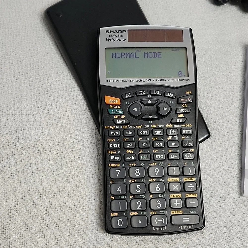Sony ICD-BX800 Recorder, headphones and Sharp EL-W516 Calculator